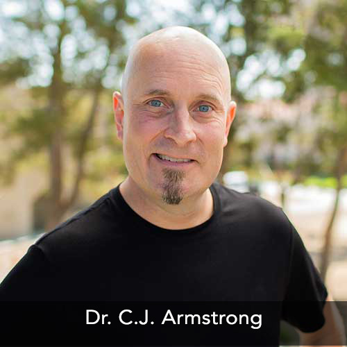 Woman holding a passport and wearing a mask